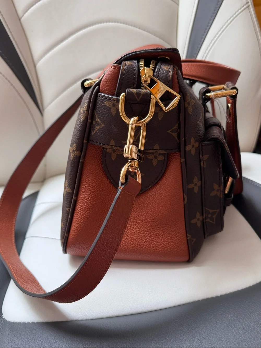Louis Vuitton Monogram manhattan Canvas Messenger Bag with Brown Leather Trim